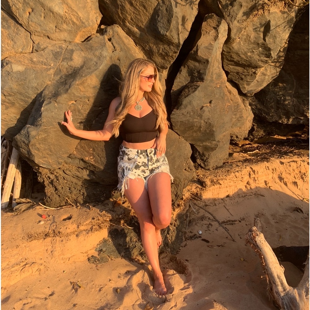 Cow Print + Sequin Fringe Cutout shorts.